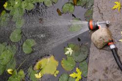 Never submerse your refill hose in the pond. Use a timer refill for auto shutoff